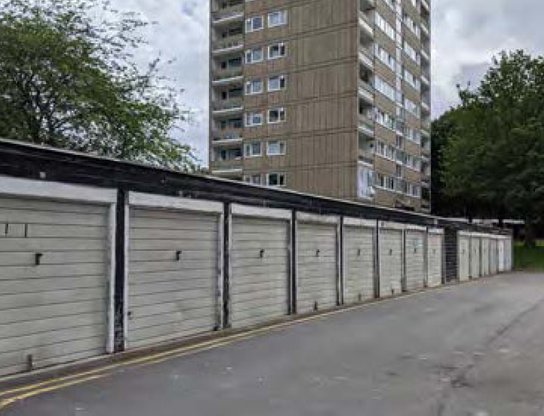 Existing garages on the site Existing garages on the site